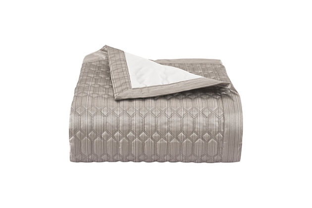 Add some sleek luxury to your bedroom with this glamorous Luxembourg Quilt. Constructed with a soft elegant fabric that features a fine stria stripe in two tones of silver with a detailed diamond quilt stitching to create a balance of symmetry and intricate detail. Coordinate shams and pillows are available separately.A sleek bedding alternative to a comforter | Made with design house quality fabric and craftsmanship.