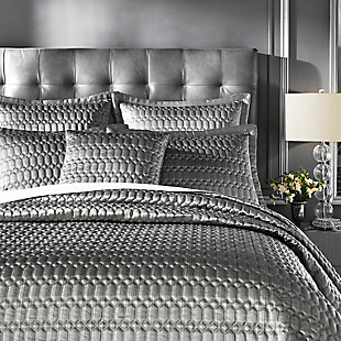 Add some sleek luxury to your bedroom with this glamorous Luxembourg Quilt. Constructed with a soft elegant fabric that features a fine stria stripe in two tones of silver with a detailed diamond quilt stitching to create a balance of symmetry and intricate detail. Coordinate shams and pillows are available separately.A sleek bedding alternative to a comforter | Made with design house quality fabric and craftsmanship.