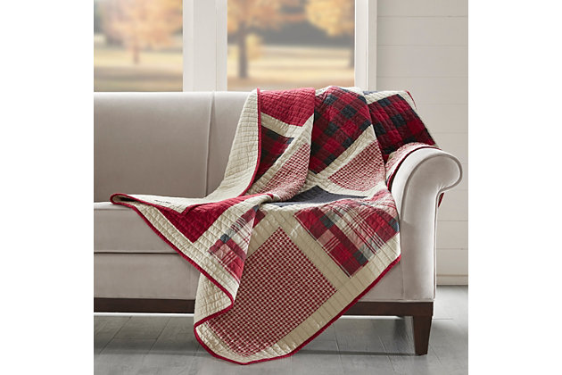 The Woolrich Huntington oversized quilted throw features a classic pieced design with a mix and match of plaids and solids. Made from cotton, this lightweight throw is soft to the touch and can be used year-round.Made of 100% cotton | Plaid print; solid reverse | Quilted | Machine washable | Imported