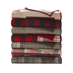 The Woolrich Huntington oversized quilted throw features a classic pieced design with a mix and match of plaids and solids. Made from cotton, this lightweight throw is soft to the touch and can be used year-round.Made of 100% cotton | Plaid print; solid reverse | Quilted | Machine washable | Imported