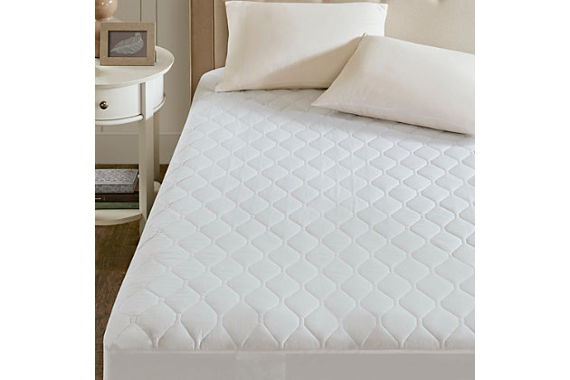 Cover your bed with the Beautyrest Heated Mattress Pad using Secure Comfort technology. Designed to virtually eliminate Electromagnetic Field emissions, this heated mattress pad features a 10-hour auto-shut off timer and a 5 setting temperature control to ensure your safety. The soft flexible wires and quilted top provide exceptional comfort, while the fitted skirt perfectly fits up to a 18" mattress. Made from a cotton polyester blend, our heated mattress pad is machine washable for easy care. Twin, Twin XL, and Full sizes have one controller, while Queen, King, and Cal King sizes have two controllers. Includes manufacturer's 5-year warranty.Imported | Virtually eliminates electro magnetic field emissions | 10 hour auto shut off | 5 setting temperature control, controler works | Soft flexible wires | Controller works with smart home outlets and automatic timers, 1 for Twin and Full size, 2 for Queen and King size | Machine washable | Fits up to a 18" mattress | 60% cotton 40% polyester | Includes manufacturer's 5-year warranty