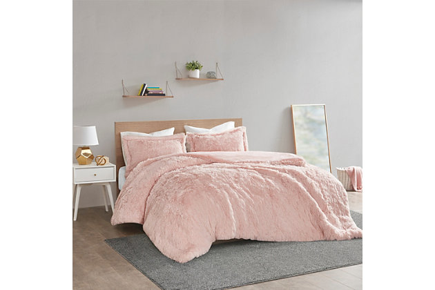 The Intelligent Design Malea shaggy fur duvet cover set brings a soft, contemporary update to your bedroom. It's made with a stylish shaggy faux fur that creates a soft fluffy texture, with a solid plush reverse for added warmth. A zipper closure secures your insert within the duvet cover and inside corner ties prevent it from shifting.Includes comforter and 2 matching shams | Made of polyester | Oeko-Tex Certified, includes no harmful substances or chemicals | Duvet with inside corner ties to secure the insert (not included), zipper closure | Machine washable | Imported