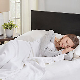 Cozy up in one of the softest cotton blankets on the market. This blanket's cotton material virtually eliminates pilling and snagging to give you a long-lasting source of comfort. Naturally wic away moisture, this blanket is breathable to help regulate your temperature at night.Made of 100% cotton | Eliminates pilling, snagging and shrinkage | Machine washable | Imported