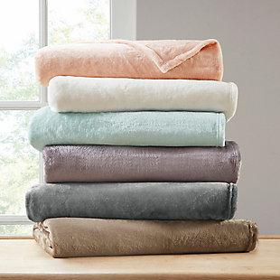 Wrap yourself up in the Madison Park microlight plush blanket. Providing year-round comfort, it's light enough to be used in the warmest summer months and makes the perfect layering piece during the winter. Ultra-soft, this rich blanket is machine washable for easy care.Made of polyester | 1" self hem  | Machine washable | Imported