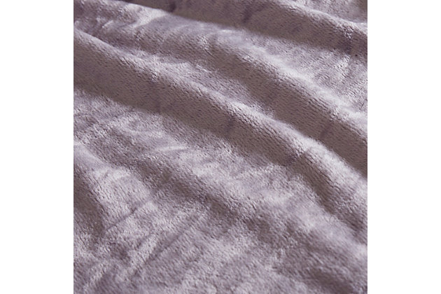 Wrap yourself up in the Madison Park microlight plush blanket. Providing year-round comfort, it's light enough to be used in the warmest summer months and makes the perfect layering piece during the winter. Ultra-soft, this rich blanket is machine washable for easy care.Made of polyester | 1" self hem  | Machine washable | Imported