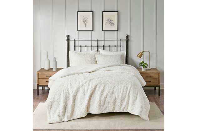 Add warmth and comfort to your bed with this ultra plush comforter set. The faux fur is incredibly soft and features a beautiful medallion design for added texture and dimension. The set is machine washable for easy care.Includes comforter and matching sham | Made of polyester | Polyester fill | Sham only; pillow insert not included | Machine washable  | Imported