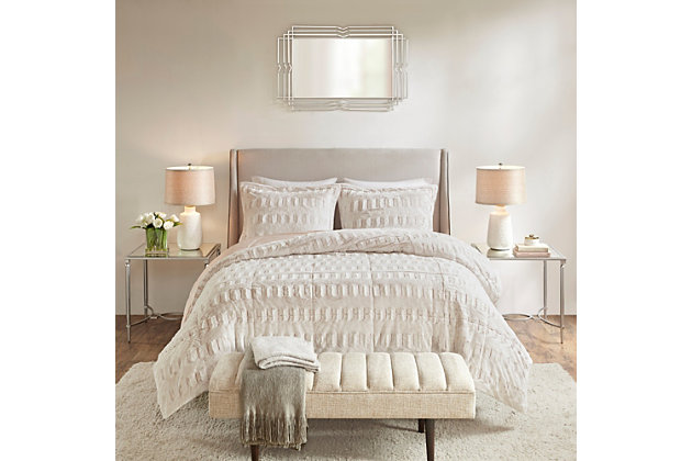 Sleep in the pure softness and comfort of the Madison Park Gia back print long fur comforter mini set. The ultra-soft comforter flaunts a stylish brushed faux fur on the face that flips to a faux mink reverse for a luxurious look and feel. Incredibly plush, this reversible long fur comforter mini set brings the perfect amount of comfort and glamorous style to your bedroom decor.Includes comforter and 2 matching shams | Made of polyester | Hypoallergenic polyester filling  | End-to-end box sewn comforter keeps fill in place | Sham only; pillow insert not included | Machine washable | Imported