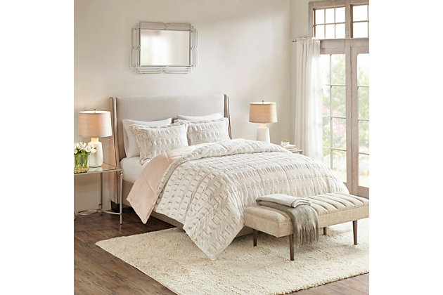 Sleep in the pure softness and comfort of the Madison Park Gia back print long fur comforter mini set. The ultra-soft comforter flaunts a stylish brushed faux fur on the face that flips to a faux mink reverse for a luxurious look and feel. Incredibly plush, this reversible long fur comforter mini set brings the perfect amount of comfort and glamorous style to your bedroom decor.Includes comforter and 2 matching shams | Made of polyester | Hypoallergenic polyester filling  | End-to-end box sewn comforter keeps fill in place | Sham only; pillow insert not included | Machine washable | Imported