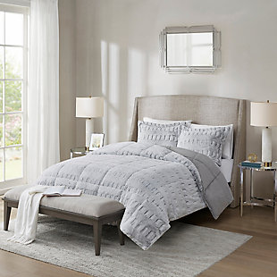 Sleep in the pure softness and comfort of the Madison Park Gia back print long fur comforter mini set. The ultra-soft comforter flaunts a stylish brushed faux fur on the face that flips to a faux mink reverse for a luxurious look and feel. Incredibly plush, this reversible long fur comforter mini set brings the perfect amount of comfort and glamorous style to your bedroom decor.Includes comforter and matching sham | Made of polyester | Hypoallergenic polyester filling  | End-to-end box sewn comforter keeps fill in place | Sham only; pillow insert not included | Machine washable | Imported