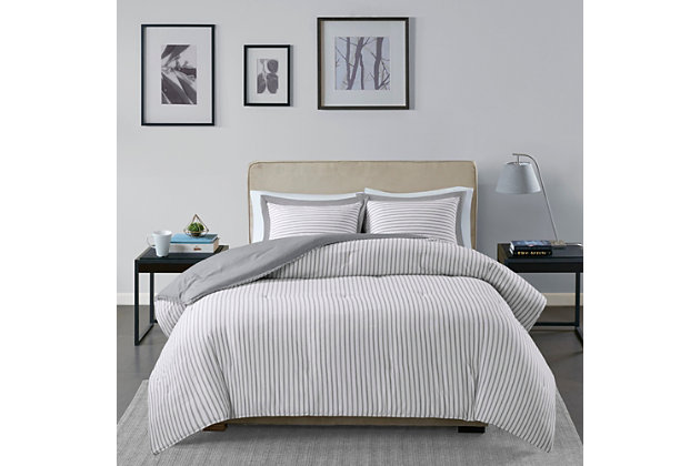 The Madison Park Essential Hayden reversible down alternative comforter mini set gives your bedroom a fresh, casual update. Sporting a striped pattern, the comforter and sham reverse to a solid hue, allowing you to mix and match styles for the perfect look. Machine washable, this reversible comforter is made from ultra-soft yarn-dyed fabric that is sure to keep you warm all year round.Includes comforter and matching sham | Made of polyester | Down alternative hypoallergenic polyester filling | Machine washable | Imported