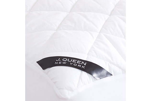 The J. Queen New York Regal Waterproof Mattress Pad is the perfect foundation to keep your mattress protected and clean. The cotton top mattress pad is specially engineered with an allergen-barrier sleep surface to prevent dust mites, pet dander, pollen and other allergens from penetrating your bedding. The reverse poly layering is waterproof for added protection and soundless for a restful night’s sleep. The hypoallergenic ultra-lofty fiberfill mattress pad is diamond quilted for a smooth, breathable sleep surface. The four-way deep pocket stretch skirt can fit a mattress up to 21 inches.Made of 100% cotton | Hypoallergenic polyfill | Protects and extends the life of your mattress  | Fitted sheet stretches to fit the deepest mattresses; works great with smaller low-profile mattresses (7"-20") | Waterproof | Adds comfort and support to your mattress | Imported