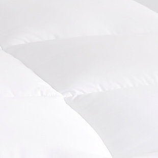 The J. Queen New York Regency overstuffed mattress topper adds an additional layer of cloud-like comfort to your mattress for an incredible sleep experience. The plush 300-thread-count cotton top mattress topper features Comfordry™ technology which helps keep your sleep surface cool and dry by wicking away moisture for a more comfortable night’s sleep. Also featuring NuAir™, an allergen-barrier fabric to prevent dust mites, pet dander, pollen and other allergens from penetrating the bedding. The topper is filled with down-like hypoallergenic fiberfill which provides superior support and a silky-smooth surface. The mattress topper is box quilted to prevent fiber shifting and the comforter is crafted with a two-inch gusset on all sides for added loft, support, and breathability. The four-way deep pocket stretch skirt can fit a mattress up to 21 inches.Made of 100% sateen cotton for a luxurious hand feel | Hypoallergenic polyfill | Specially engineered with NuAir™ allergen-barrier fabric to prevent dust mites, pet dander, pollen and other allergens from inhabiting the comforter | ComforDry™ technology keeps the body dry by drawing away moisture to keep you cool and helps prevent uncomfortable night sweats | Duoloft™ hypoallergenic fiberfill provides a silky-smooth sleep surface, all-seasons warmth and serene down-like softness | Imported