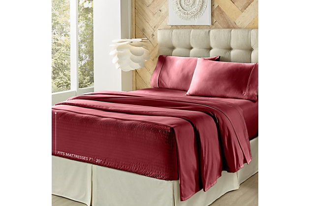 Add a luxurious feel to your bedding with this super soft four-piece sheet set by J. Queen New York. Its patented Royal Fit technology is guaranteed to fit every mattress perfectly, every time. The unique fitted sheet construction stretches to fit the deepest mattresses and mattress toppers and works great with smaller 7-20 inch low-profile mattresses. Unlike most fitted sheets, which don’t fit well or stay in place throughout the night, this fitted sheet solution will never shift or slip off. The luxuriously soft 300-thread-count cotton fabric gives the sheet set a silky-smooth hand feel, and it is machine washable. Set of 4 | Sheet set includes one flat sheet, one fitted sheet, and two pillowcases | 100% cotton fabric, 300-thread-count | Machine washable | Fitted sheet stretches to fit the deepest mattresses and works great with smaller low-profile mattresses (7"-20") | Imported