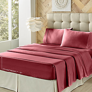 Add a luxurious feel to your bedding with this super soft four-piece sheet set by J. Queen New York. Its patented Royal Fit technology is guaranteed to fit every mattress perfectly, every time. The unique fitted sheet construction stretches to fit the deepest mattresses and mattress toppers and works great with smaller 7-20 inch low-profile mattresses. Unlike most fitted sheets, which don’t fit well or stay in place throughout the night, this fitted sheet solution will never shift or slip off. The luxuriously soft 300-thread-count cotton fabric gives the sheet set a silky-smooth hand feel, and it is machine washable. Set of 4 | Sheet set includes one flat sheet, one fitted sheet, and two pillowcases | 100% cotton fabric, 300-thread-count | Machine washable | Fitted sheet stretches to fit the deepest mattresses and works great with smaller low-profile mattresses (7"-20") | Imported