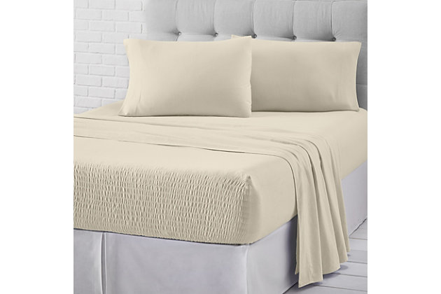 Add a cozy foundation of winter warmth to your bed with the J. Queen New York cotton flannel sheet set. Its patented Royal Fit technology is guaranteed to fit every mattress perfectly, every time. The unique fitted sheet construction stretches to fit the deepest mattresses and mattress toppers and works great with smaller 7-20 inch low-profile mattresses. Unlike most fitted sheets, which don’t fit well or stay in place throughout the night, this fitted sheet solution will never shift or slip off. The noticeably soft cotton flannel fabric provides a smooth and comfortable feel, keeps your body warm during colder weather, and is machine washable for easy care. Available in multiple on-trend fashion colors to fit any bedroom decor.Set of 3 | Made of 100% cotton | Sheet set includes one flat sheet, one fitted sheet, and one pillowcase | Fitted sheet stretches to fit the deepest mattresses and works great with smaller low-profile mattresses (7"-20") | Machine washable | Imported