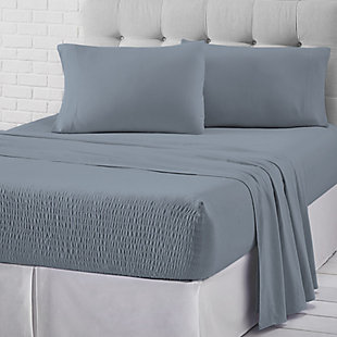 Add a cozy yet casual foundation to your bed with the J. Queen New York cotton jersey knit sheet set. Its patented Royal Fit technology is guaranteed to fit every mattress perfectly, every time. The unique fitted sheet construction stretches to fit the deepest mattresses and mattress toppers and works great with smaller 7-20 inch low-profile mattresses. Unlike most fitted sheets, which don’t fit well or stay in place throughout the night, this fitted sheet solution will never shift or slip off. The noticeably soft cotton jersey knit fabric provides a smooth, breathable feel like your favorite lounge T-shirt, and gets softer with each wash.Set of 4 | Made of 100% cotton | Sheet set includes one flat sheet, one fitted sheet, and two pillowcases | Fitted sheet stretches to fit the deepest mattresses and works great with smaller low-profile mattresses (7"-20") | Machine washable | Imported