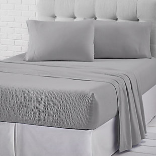 Add a cozy yet casual foundation to your bed with the J. Queen New York cotton jersey knit sheet set. Its patented Royal Fit technology is guaranteed to fit every mattress perfectly, every time. The unique fitted sheet construction stretches to fit the deepest mattresses and mattress toppers and works great with smaller 7-20 inch low-profile mattresses. Unlike most fitted sheets, which don’t fit well or stay in place throughout the night, this fitted sheet solution will never shift or slip off. The noticeably soft cotton jersey knit fabric provides a smooth, breathable feel like your favorite lounge T-shirt, and gets softer with each wash.Set of 4 | Made of 100% cotton | Sheet set includes one flat sheet, one fitted sheet, and two pillowcases | Fitted sheet stretches to fit the deepest mattresses and works great with smaller low-profile mattresses (7"-20") | Machine washable | Imported