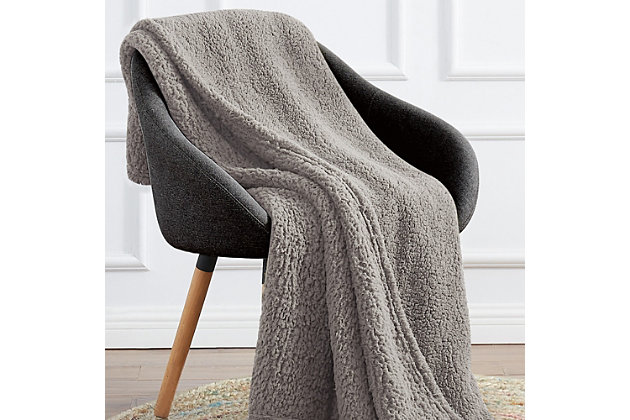 Experience sleeping on a cloud with this sherpa throw blanket. This soft and fluffy throw will elevate any sleeping experience with its faux sherpa fabric. Offered in a variety of colors, this throw blanket will accentuate any room beautifully while providing extra comfort and warmth.Made of polyester | Machine-washable; wash in appropriate size equipment to avoid damage | Imported
