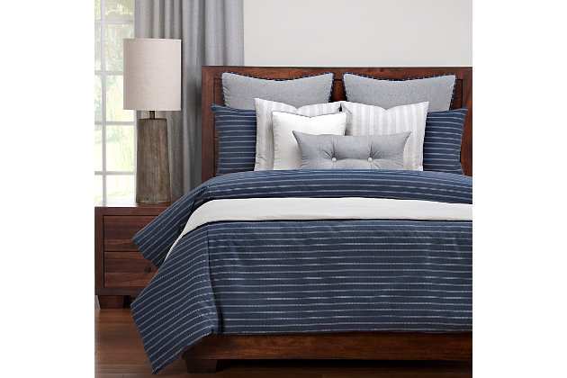 Give your bedroom a rustic makeover with this six-piece duvet cover set. Rustic stripes on the cotton blend duvet cover are woven to resemble burlap. Stuffed with a medium-weight fill made from recycled plastic bottles, this cozy comforter benefits your health and the environment when compared to natural down. This luxurious comforter is designed to keep you warm all year round.Set includes king comforter, inside duvet cover, 2 shams and 2 decorative pillows | Made of polyester | Eco-friendly down alternative fill | King shams and duvet with zipper closure | Comforter with 8 button closure | Made in USA | Machine washable