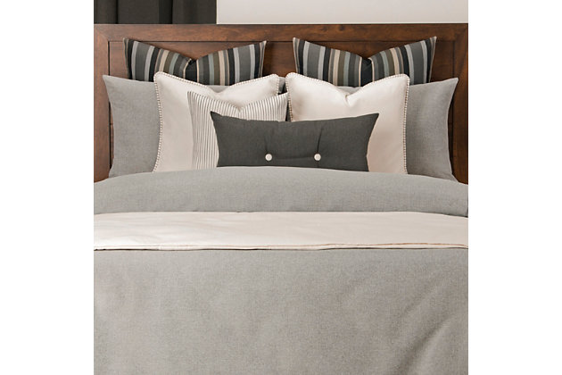 The neutral gray featured on this six-piece luxury duvet cover set will add contemporary style to your bedroom. Soft to the touch and completely stain resistant, this bedding is made with upcycled fibers without chemical treatments making it easy on the environment. Stuffed with a medium-weight fill made from recycled plastic bottles, this cozy comforter benefits your health and the environment when compared to natural down. Life is messy, but paw prints, juice spills and even permanent marker will disappear. This beautiful high end bedding is made to last.Set includes king comforter, inside duvet cover, 2 shams and 2 decorative pillows | Made of polyester | Eco-friendly down alternative fill | Stain resistant | King shams and duvet with zipper closure | Comforter with 8 button closure | Made in USA | Machine washable and bleach safe