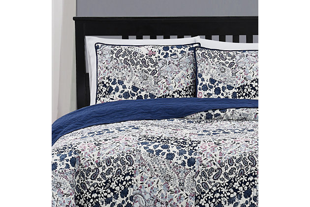 The Cannon Chelsea bedding collection features a beautiful assortment of watercolor floral and paisley prints. This quilted pattern will beautifully accent any room with a modern take on a traditional design. The accents of blue and purple tones on a white background are contrasted by a solid navy reverse. This bedding is 100% microfiber which provides a soft, yet silky feeling and is machine washable.Includes 1 quilt and 1 standard sham | Made of microfiber polyester | Quilt with cotton/polyester fill | Machine washable; wash in appropriate size equipment to avoid damage | Imported