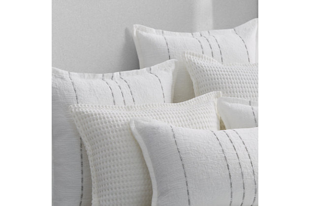 Crafted in Portugal from exceptionally fine 100% Cotton yarns, the White Haven Euro Sham adds relaxed versatility and effortless layering to your decor. Woven with ashen grey dash stripes that beautifully adorn the crisp white ripple-textured fabric. This lovely accent is finished with a flange trim, adding a refreshed dimension to your space, and coordinates beautifully with the White Haven collection.Cotton features unique insulation properties that keeps you warm in the Winter, and breathability to keep you cool in the Summer | Yarns are of the highest quality, combed, long staples, providing long lasting comfort and durability | White Sand linens are crafted with a high level of complexity and detail, and embrace distinct Portuguese weaving looms that are a mastery of many generations | White Sand products are covered by OEKOTEX STANDARD 100 CLASS I, guaranteeing chemical-free environmentally friendly materials and packaging | 100% Cotton | Imported
