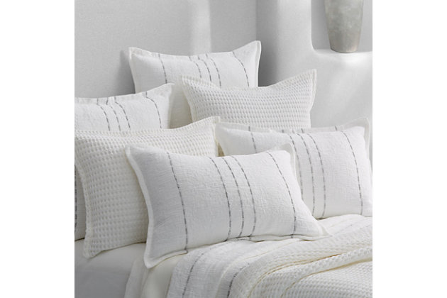Crafted in Portugal from exceptionally fine 100% Cotton yarns, the White Haven Euro Sham adds relaxed versatility and effortless layering to your decor. Woven with ashen grey dash stripes that beautifully adorn the crisp white ripple-textured fabric. This lovely accent is finished with a flange trim, adding a refreshed dimension to your space, and coordinates beautifully with the White Haven collection.Cotton features unique insulation properties that keeps you warm in the Winter, and breathability to keep you cool in the Summer | Yarns are of the highest quality, combed, long staples, providing long lasting comfort and durability | White Sand linens are crafted with a high level of complexity and detail, and embrace distinct Portuguese weaving looms that are a mastery of many generations | White Sand products are covered by OEKOTEX STANDARD 100 CLASS I, guaranteeing chemical-free environmentally friendly materials and packaging | 100% Cotton | Imported