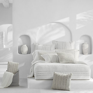 Inspired by luxury yet casual Beach House decor, the White Haven Quilt offers relaxed versatility and effortless elegance to your sleep space. Crafted in Portugal from fine cotton yarns that develop incredible comfort and softness over time. Further detailed with woven ashen grey dash stripes that beautifully adorn a crisp white ripple-textured airy fabric. This lush lightweight quilt adds a refreshed dimension to your space, and coordinates beautifully with the White Haven collection.Cotton features unique insulation properties that keeps you warm in the Winter, and breathability to keep you cool in the Summer | Yarns are of the highest quality, combed, long staples, providing long lasting comfort and durability | White Sand linens are crafted with a high level of complexity and detail, and embrace distinct Portuguese weaving looms that are a mastery of many generations | White Sand products are covered by OEKOTEX STANDARD 100 CLASS I, guaranteeing chemical-free environmentally friendly materials and packaging | 100% Cotton | Imported