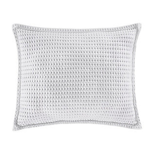 Crafted in Portugal from exceptionally fine 100% Cotton yarns, the Pebble Beach Pillow Sham adds relaxed versatility and effortless layering to your decor. Thoughtfully textured with a honeycomb weave and a lightweight luster. Garment dyed in an array of essential shades such as white, navy, sand, and stone for a tasteful touch of dimension to your sleep space, and coordinates beautifully with the Pebble Beach Throw and White Sand collection.Cotton features unique insulation properties that keeps you warm in the Winter, and breathability to keep you cool in the Summer | Yarns are of the highest quality, combed, long staples, providing long lasting comfort and durability | White Sand linens are crafted with a high level of complexity and detail, and embrace distinct Portuguese weaving looms that are a mastery of many generations | White Sand products are covered by OEKOTEX STANDARD 100 CLASS I, guaranteeing chemical-free environmentally friendly materials and packaging | 100% Cotton | Imported