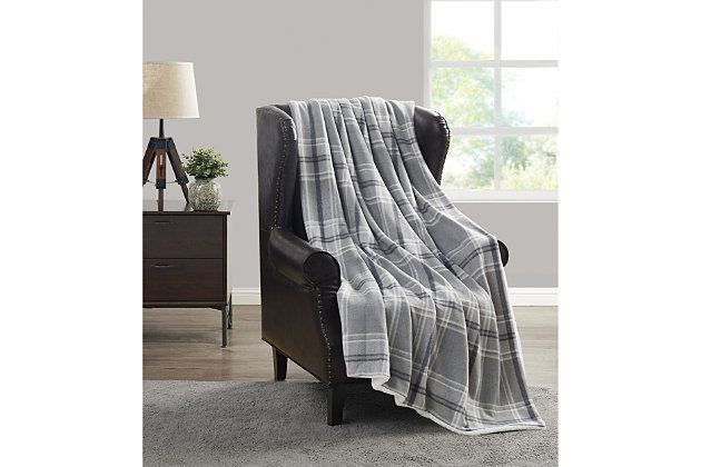 The Cannon Cozy Teddy Plaid Collection features a classic tartan plaid design printed on a sweater knit brushed fabric with a faux Sherpa reverse. This collection is available in a multitone gray plaid along with a soothing blue and cream plaid. These patterns are a perfect and timeless addition to any room. The Sherpa design is soft and cozy, like a teddy bear. This collection is great for a cold night or whenever you are craving an extra layer of comfort and warmth.Made of polyester and faux Sherpa | Reversible | Imported | Machine washable
