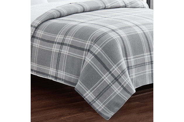 The Cannon Cozy Teddy Plaid Collection features a classic tartan plaid design printed on a sweater knit brushed fabric with a faux Sherpa reverse. This collection is available in a soothing blue and cream plaid, along with a multi tone grey plaid. These patterns are a perfect and timeless addition to any room. The Sherpa design is soft and cozy, like a teddy bear. This collection is great for a cold night, or whenever you are craving an extra layer of comfort and warmth.Face is a printed and brushed 240 GSM microfiber polyester knit plush fabric that reverses to a 200 GSM polyester plush sherpa. | Imported | Sweater knit brushed fabric | Plush, soft material that will keep you warm | Tartan plaid design