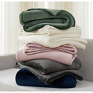 Stay snug and cozy all year round with Cannon's Solid Plush blankets. Made with 280 grams per square meter of the finest microfiber fabric, these blankets are guaranteed to be the new favorite item in your home. The Solid Plush Blankets are also offered in a variety of colors to help compliment your bedroom, living room, or any area of your home where comfort is required.Face and back is 100% polyester with a weight of 280 grams per square meter. | Imported | Soft and cozy | 280 GSM plush fabric | Machine washable