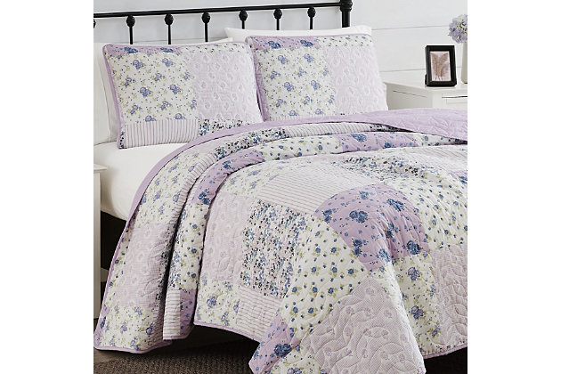 Cannon's Elissa Patchwork quilt set is a new twist on a classic style. This bedding set features a leaf quilt stitch and a variety of printed patchwork designs with soft watercolor blue and purple florals, reversing to a solid light purple. The pattern is also included on the coordinating sham. The microfiber fabric is soft to the touch and the cotton polyester blended filling will provide you with the right amount of warmth for any season.Set includes quilt and 1 sham | Made of polyester | Soft polyfill | Imported | Machine washable