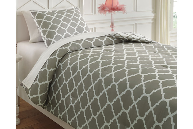 Your little fashionista will love the clean, modern appeal of the Media comforter set. Finished in ever-so-versatile gray and white, with a reversible geometric design, it’s got that chic panache that’s sure to delight any fashion-forward trendsetter.Set includes comforter and 1 pillow sham | Polyester microfiber cover | Polyester fill | Imported | Machine washable
