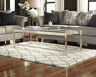 A lattice pattern in cream and charcoal weaves a touch exotic element into an everyday practical style. Subtle enough to beautifully blend. Dramatic enough to make a statement. Deep shag pile is plush beyond compare.Made of polypropylene | Machine woven | 38mm pile | Jute backing | Rug pad recommended | Spot clean only | Imported