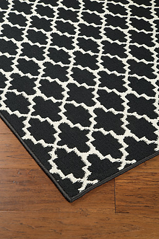 The Nathanael accent rug places high style and utility into full view. Its cream lattice pattern aesthetically pleases while adding a touch of exotic flair to your space. Rest assured, the durable polypropylene is equipped to withstand the tests of time.Made of polypropylene | Machine tufted | Rug pad recommended | Imported | Spot clean