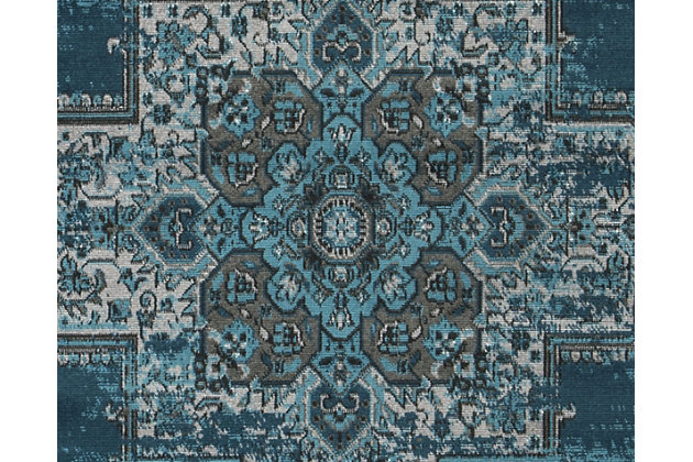 Keep bold and dramatic style underfoot with the Moore rug. A blue, brown and gray color combination brings this Moroccan design to life. What else is there to love? How about its feel-good texture.Made of polypropylene | Machine woven | 12mm pile | Jute backing | Rug pad is recommended | Spot clean | Imported