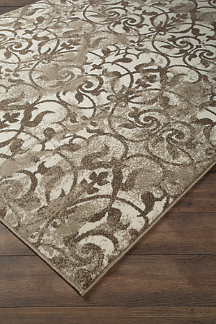 Scroll with it. If you’re looking for a touch of tradition, the elegantly scrolled Cadrian area rug is a natural choice. Ultra-neutral palette is pleasing to the eye and so easy to work with.Made of polypropylene | Machine woven | 8mm pile | Jute backing | Rug pad recommended | Spot clean only | Imported