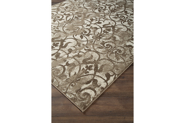 Scroll with it. If you’re looking for a touch of tradition, the elegantly scrolled Cadrian area rug is a natural choice. Ultra-neutral palette is pleasing to the eye and so easy to work with.Made of polypropylene | Machine woven | 8mm pile | Jute backing | Rug pad recommended | Spot clean only | Imported