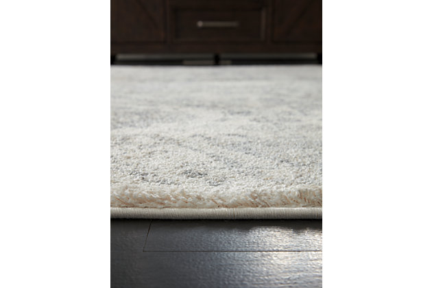 Masterfully styled medallion accent rug rolls out traditional style with a fresh perspective. Muted palette is easy on the eyes. Plush pile is heavenly underfoot.Made of polypropylene | Machine woven | 19mm pile | Cotton backing | Rug pad recommended | Spot clean only | Imported
