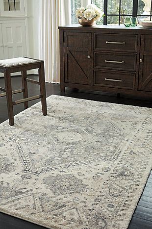 Masterfully styled medallion accent rug rolls out traditional style with a fresh perspective. Muted palette is easy on the eyes. Plush pile is heavenly underfoot.Made of polypropylene | Machine woven | 19mm pile | Cotton backing | Rug pad recommended | Spot clean only | Imported
