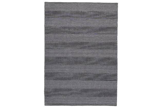 Shades of gray and chic stripes give the Kaelynn area rug a sense of casually cool style. Crafted for indoor-outdoor use, it’s the essence of easy, sophisticated living.Made of polyester | Indoor/outdoor safe | Hand woven | 2mm pile | No backing; rug pad recommended | Spot clean only | Imported
