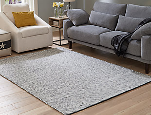 For a clean and cool modern look, cover your floor with the Jonalyn area rug. A raised stitched rug, this floor covering offers casual style in an easy way with a white, gray and charcoal palette designed to fit into many interiors.Made of wool/viscose blend | Handwoven | No pile | Cotton backing | Rug pad recommended | Spot clean only | Imported