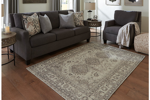 Elevate the look of any room with a timeless classic. The Laycie jacquard dhurrie is elegant and always fashionable in multicolored hues finished with a distressed border design.Made of 100% wool | Backed with wool/polyester blend | No pile | Spot clean | Rug pad recommended | Imported