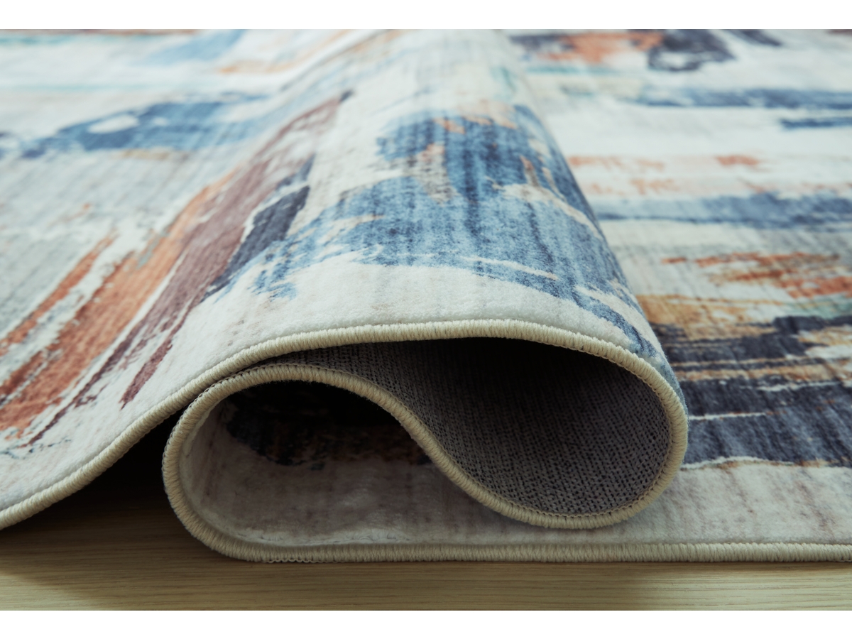 Hessland 5' x 7' Washable Rug | Ashley