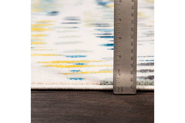 Why play it safe, when you can transform a space with big, bold and brilliant color? Saturated with deep, dramatic hues, this designer area rug stands out from the crowd for all the right reasons.Made of polypropylene | Machine woven | Medium pile | No backing; rug pad recommended | Spot clean | Imported