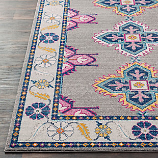 Why play it safe, when you can transform a space with big, bold and brilliant color? Saturated with deep, dramatic hues, this designer area rug stands out from the crowd for all the right reasons.Made of polypropylene | Machine woven | No backing | Medium pile; rug pad recommended | Spot clean | Imported