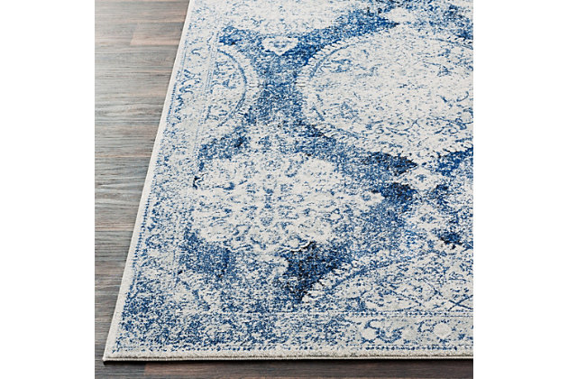 When your room needs a dash of color and pop of personality, this wonderfully versatile rug is just the ticket. Distressed, dyed effect softens the aesthetic for understated good looks that complement virtually any decor.Made of polypropylene | Machine woven | No backing | Medium pile; rug pad recommended | Spot clean | Imported