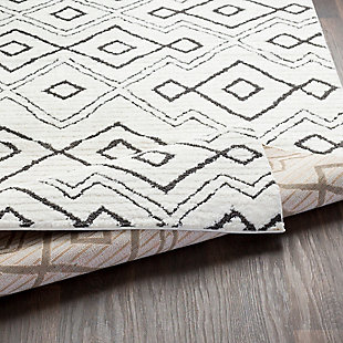 Simply timeless and beautifully on trend, this masterfully crafted moroccan style area rug is dressed to impress. Easy elegant and casually cool, it looks right at home whether your furnishings are classic or contemporary.Made of polyester and polypropylene | Machine woven | High pile | No backing; rug pad recommended | Spot clean | Imported
