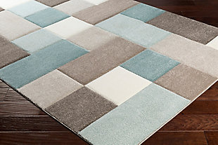 Delineate a space in a beautiful way with this designer area rug. Its gorgeous geometric design infuses a modern sensibility that simply suits your style.Made of polypropylene | Machine woven | High pile | No backing; rug pad recommended | Spot clean | Imported